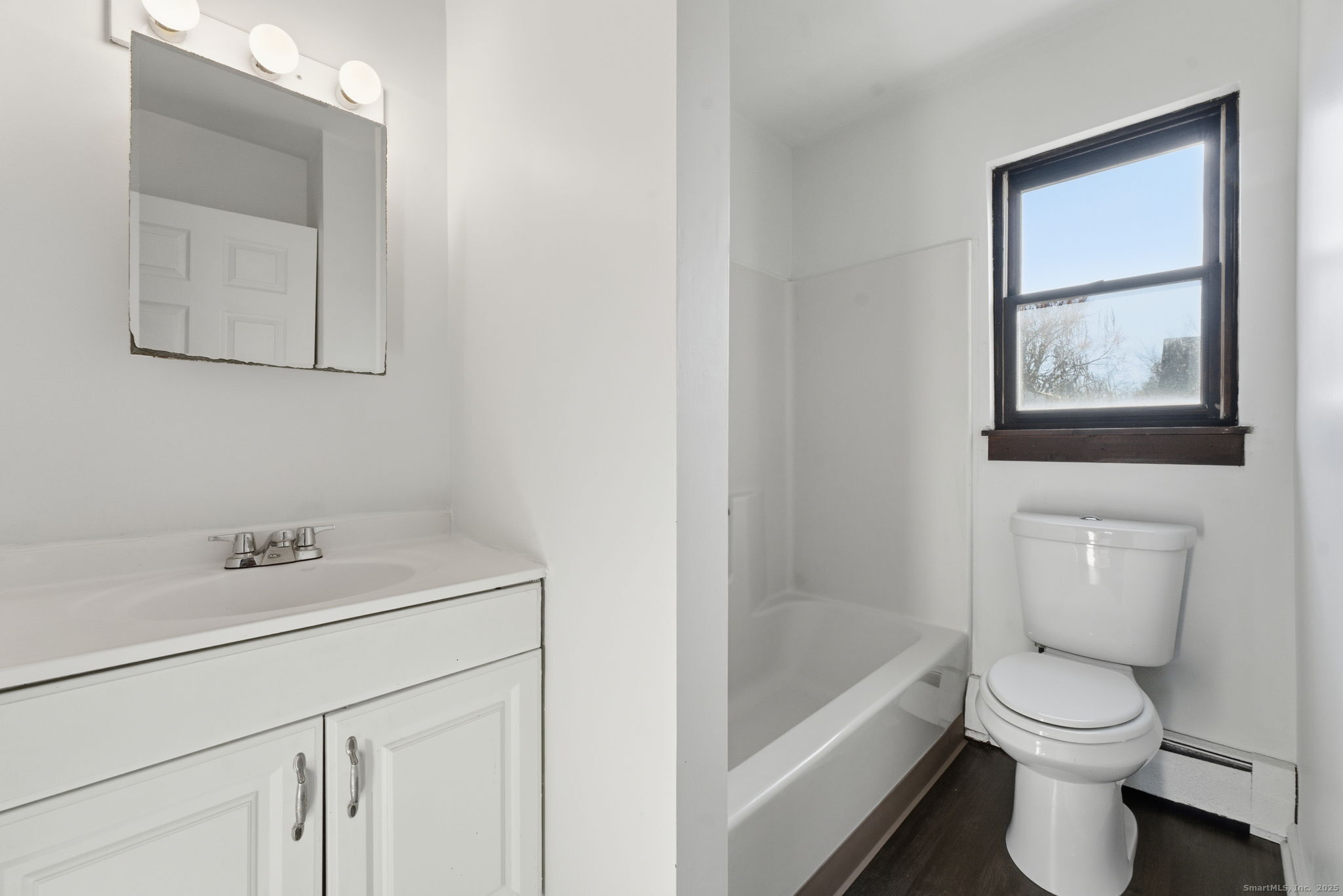 33 Guilford Street, Unit B Hartford, CT 06120 - Photo 17 of 20 a bathroom with a sink a toilet and shower