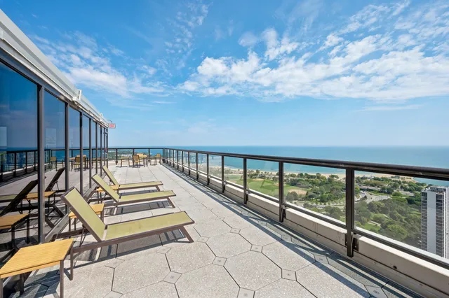 a view of a balcony with city view
