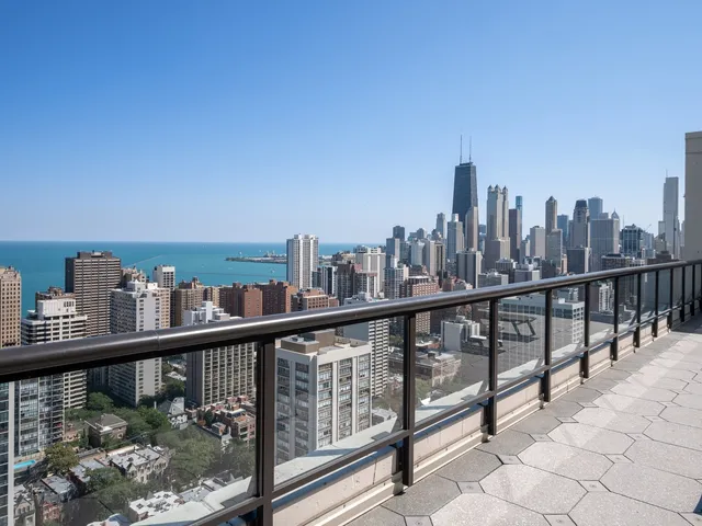a view of swimming pool with chairs