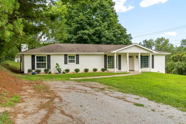 front view of a house and a yard