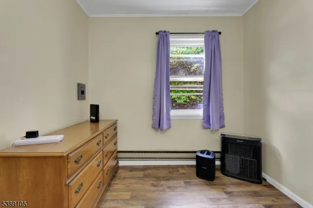a spacious bathroom with a bathtub and a window