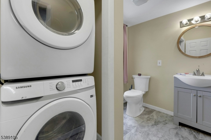 28 Risley Road West Milford, NJ 07421 - Photo 19 of 23 a bathroom with a toilet and a sink