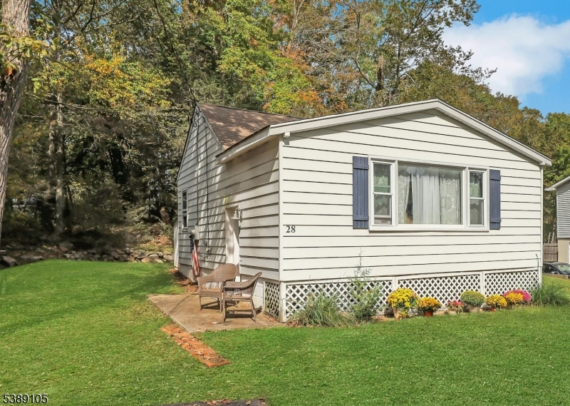 28 Risley Road West Milford, NJ 07421 - Photo 3 of 23 a front view of a house with a yard