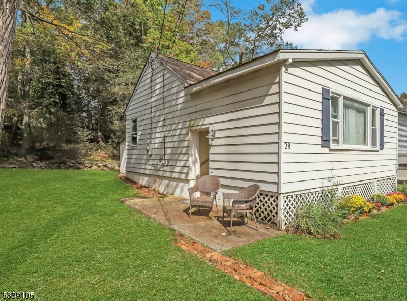 28 Risley Road West Milford, NJ 07421 - Photo 4 of 23 a view of a house with a backyard