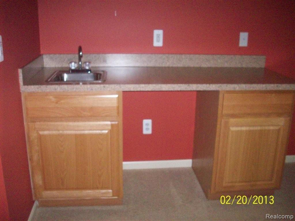 1044 Spirea, Unit 57 Howell, MI 48843 - Photo 20 of 23 Basement Wetbar