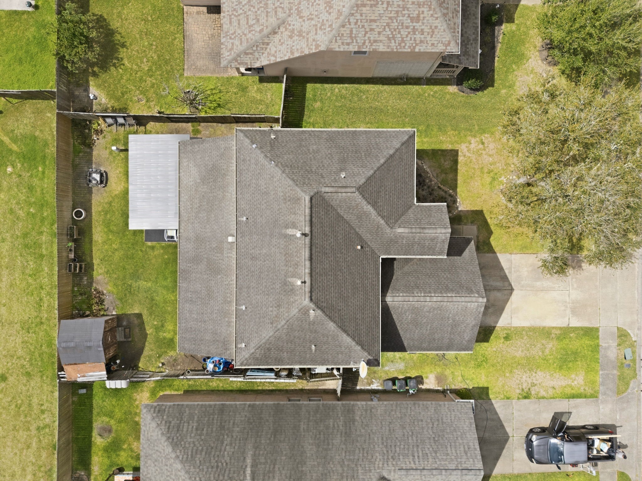 1319 Collier Point Lane Fresno, TX 77545 - Photo 33 of 33 Overhead aerial imagery reveals the home’s impressive footprint, thoughtfully designed roofline, and the spacious backyard that offers plenty of room for outdoor enjoyment.