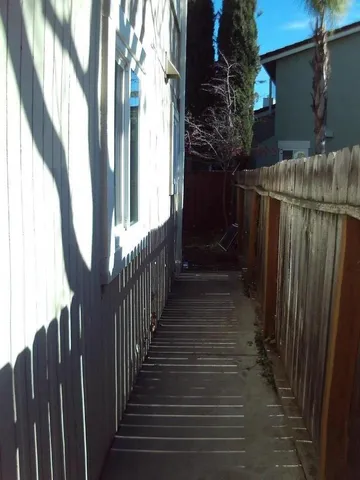 an empty room that has a window in it