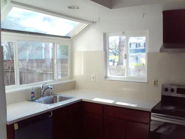 a view of cabinets with wooden floor