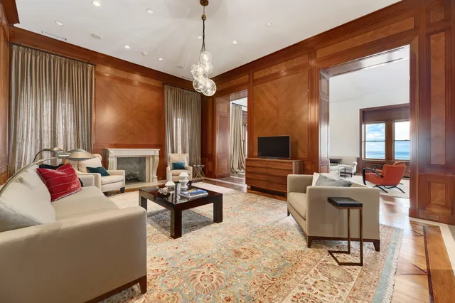 a kitchen with a stove a refrigerator and a sink