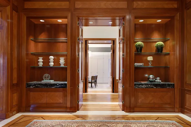 a kitchen with a sink cabinets and stainless steel appliances