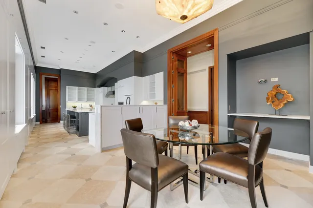 a kitchen with stainless steel appliances granite countertop a sink and a stove