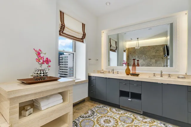 a living room with stainless steel appliances kitchen island granite countertop furniture and a kitchen view