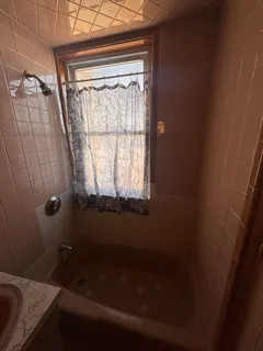 a bathroom with a bathtub