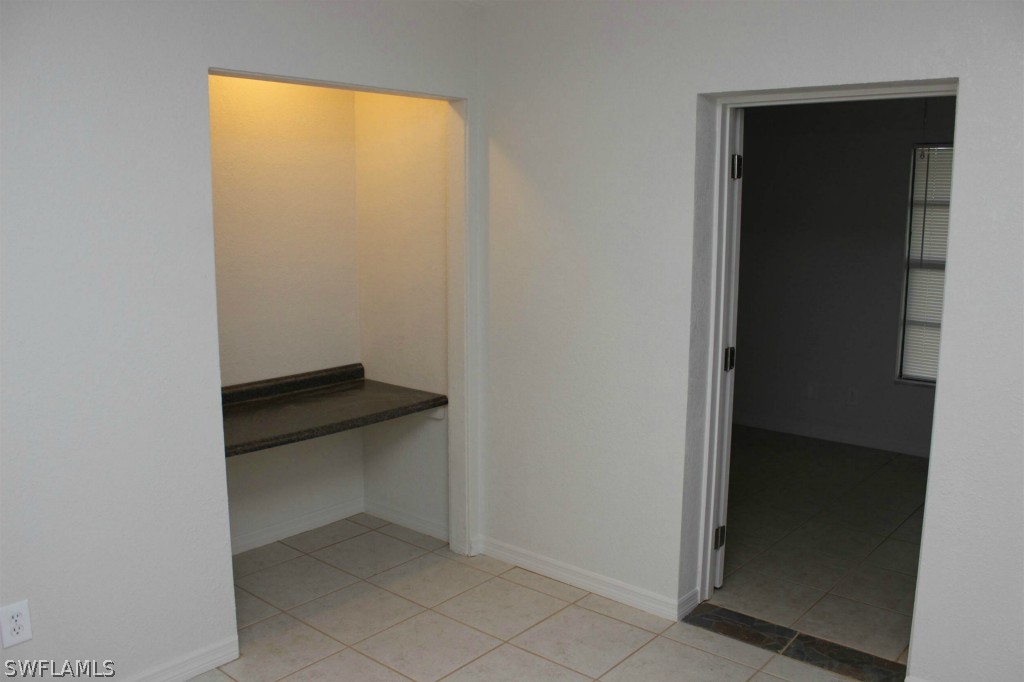 112 Florida Road Lehigh Acres, FL 33936 - Photo 16 of 25 an empty room with entrance