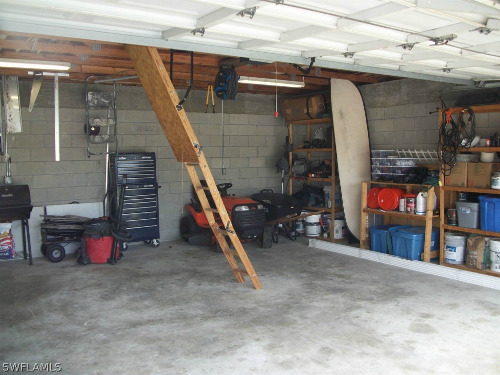 112 Florida Road Lehigh Acres, FL 33936 - Photo 22 of 25 a view of storage and utility room