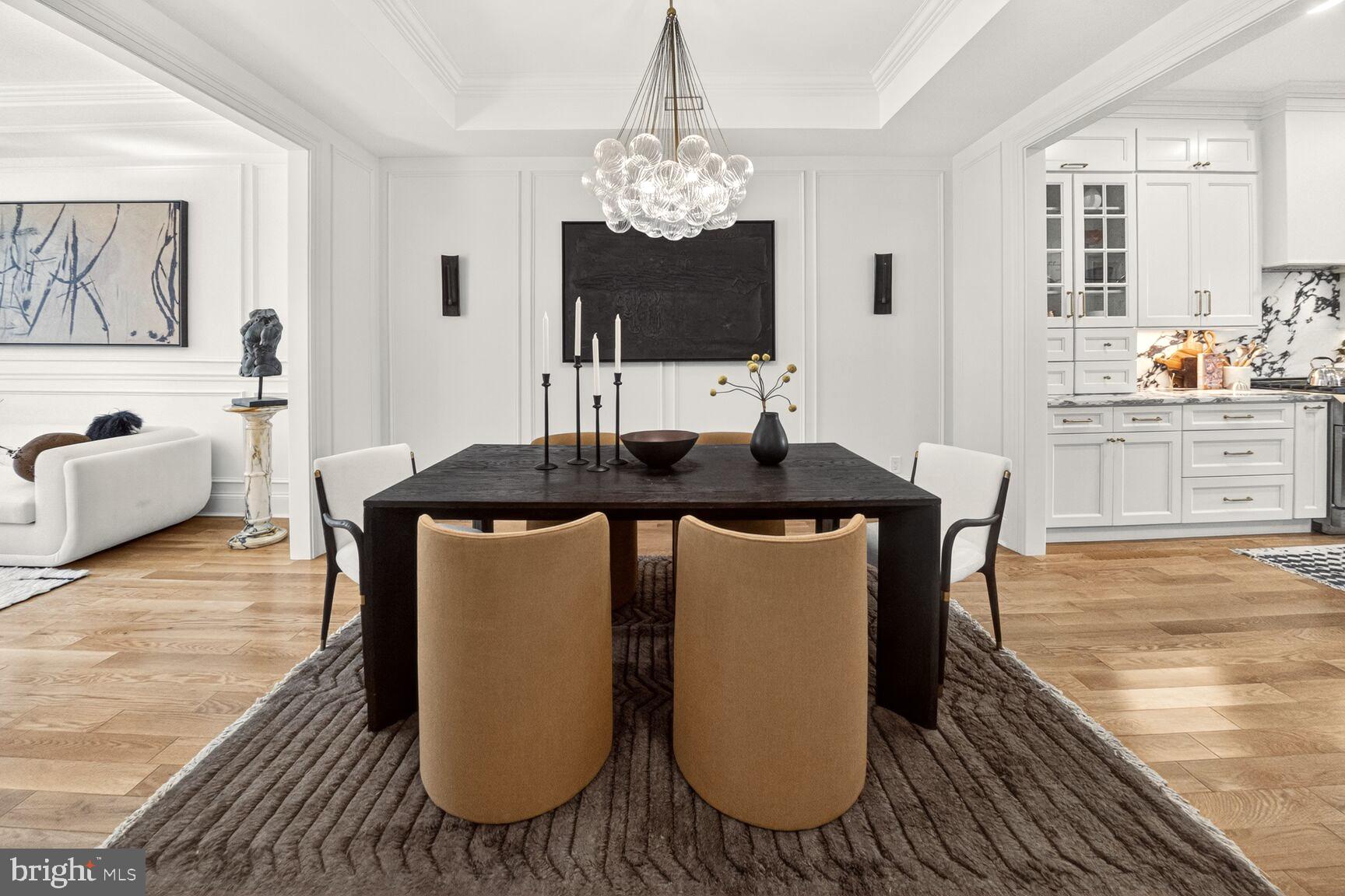 1203 T Street Northwest Washington, DC 20009 - Photo 11 of 46 a dining room with chandelier and wooden floor