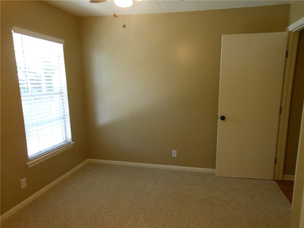 2516 Enfield Road, Unit 201 Austin, TX 78703 - Photo 11 of 11 an empty room with a window