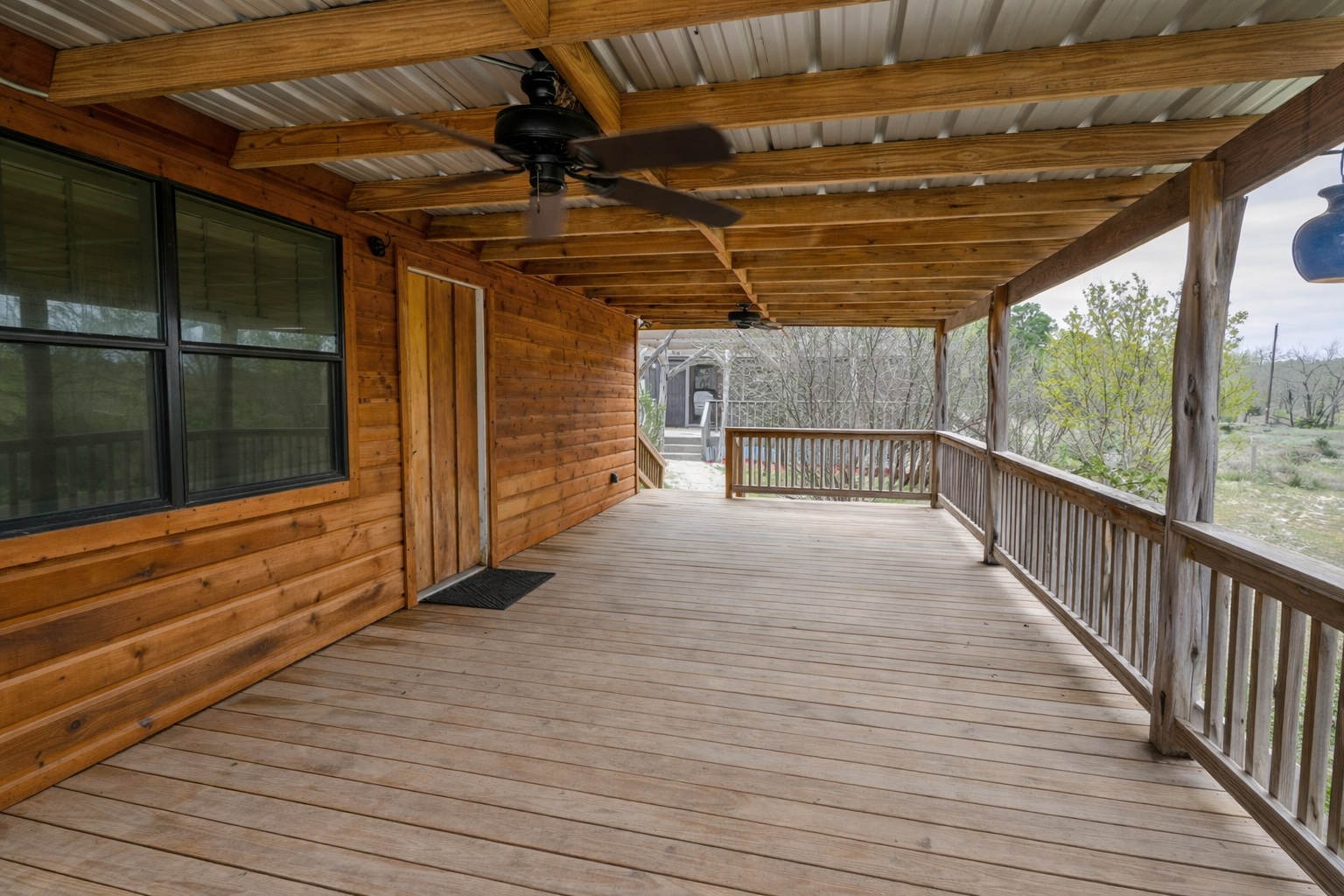6980 Doss-Spring Creek Road Fredericksburg, TX 78624 - Photo 8 of 20 Front deck on Main Cabin.