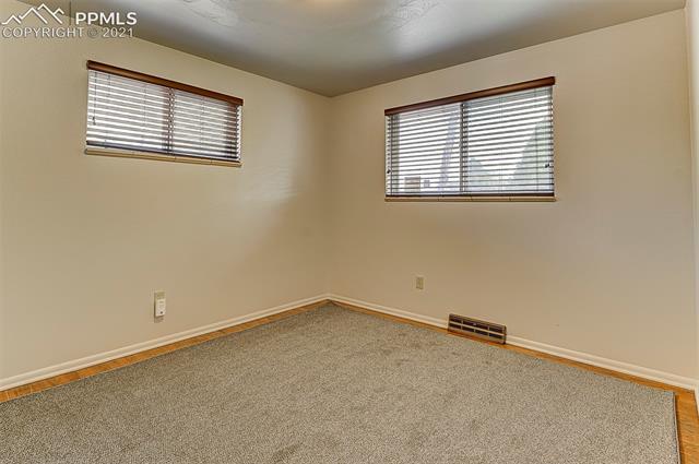 18 North Chelton Road Colorado Springs, CO 80909 - Photo 16 of 32 main level bed 2