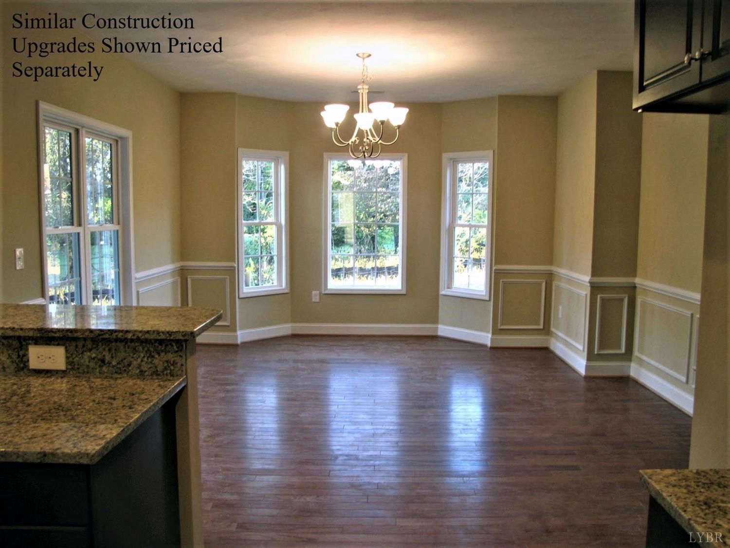 291 Crystal Lane Evington, VA 24550 - Photo 3 of 16 a view of a kitchen cabinets and wooden floor