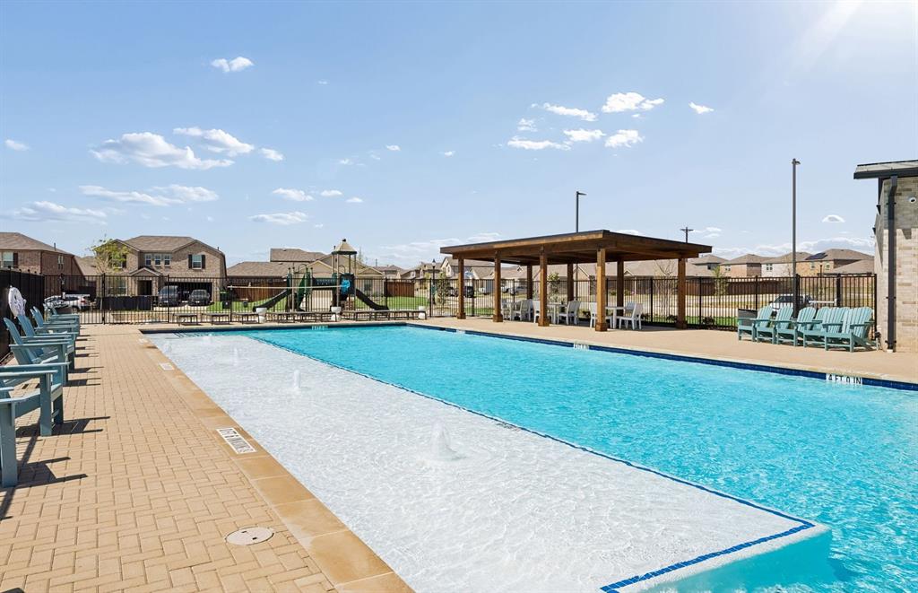 7509 Bent Gale Road Pilot Point, TX 76258 - Photo 24 of 26 a view of a swimming pool with an outdoor seating
