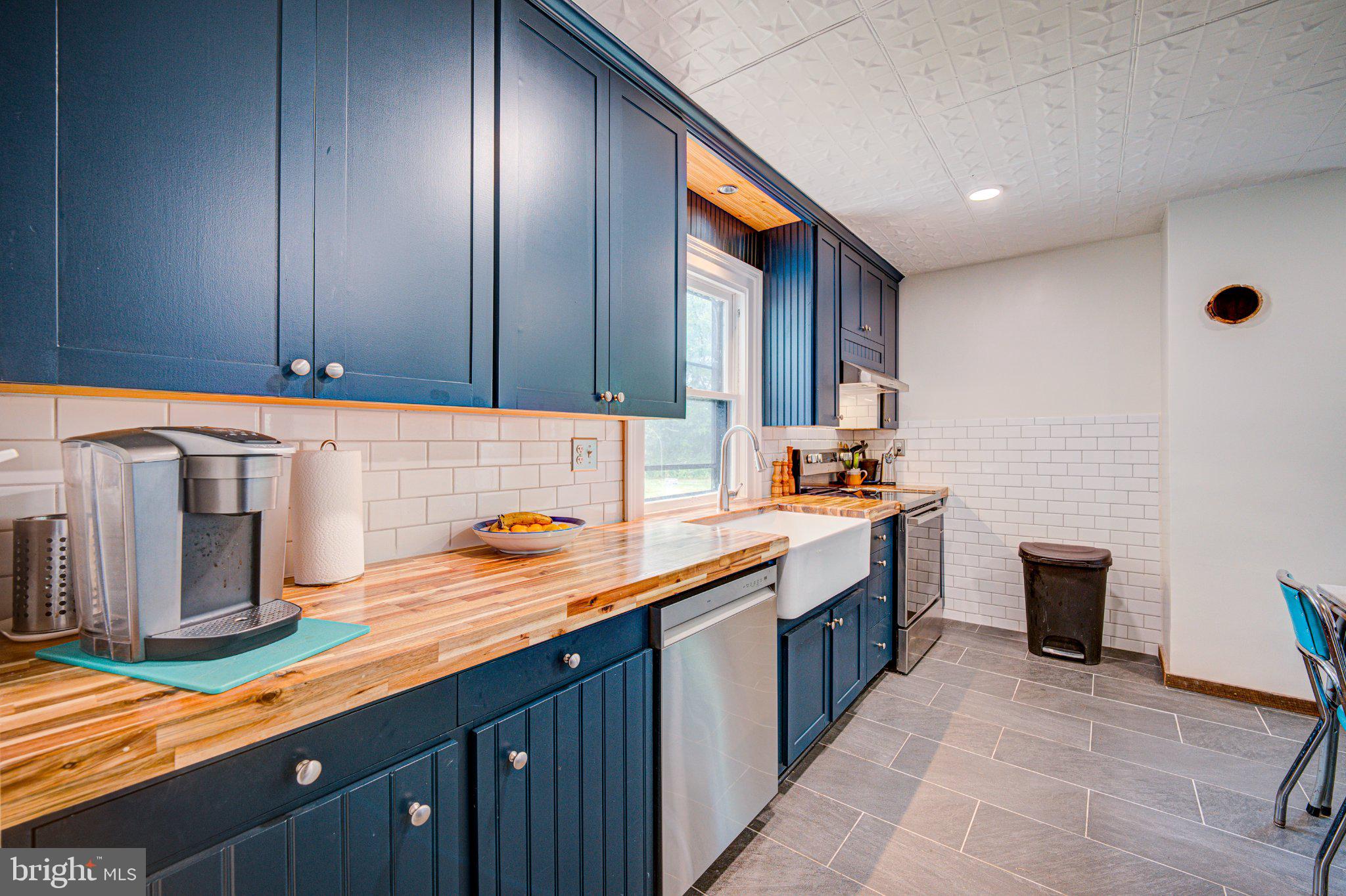 24177 Rapidan Road Mitchells, VA 22729 - Photo 4 of 43 Charming kitchen with modern flair.