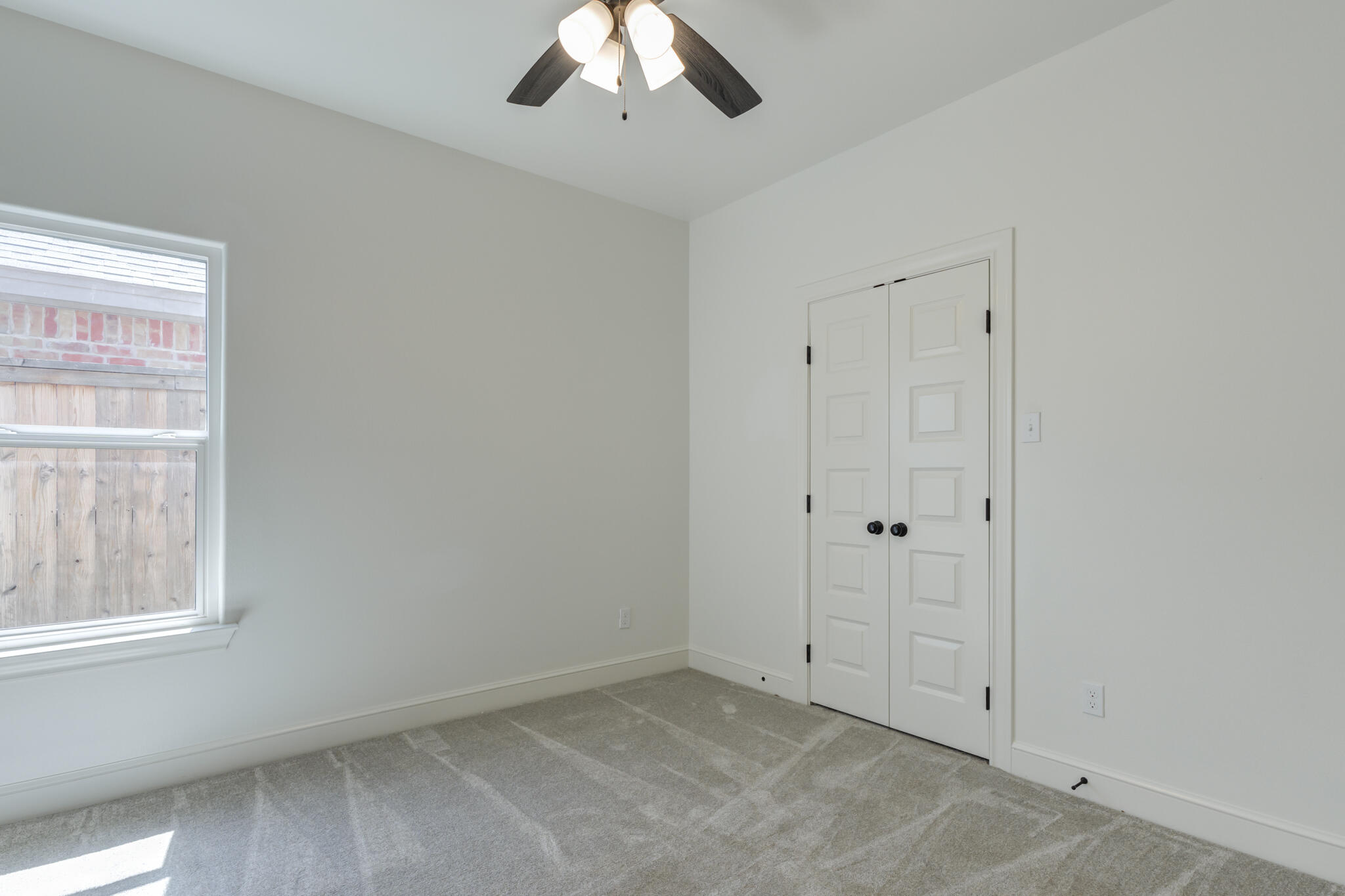 5720 119th Street Lubbock, TX 79424 - Photo 15 of 43 an empty room with a window