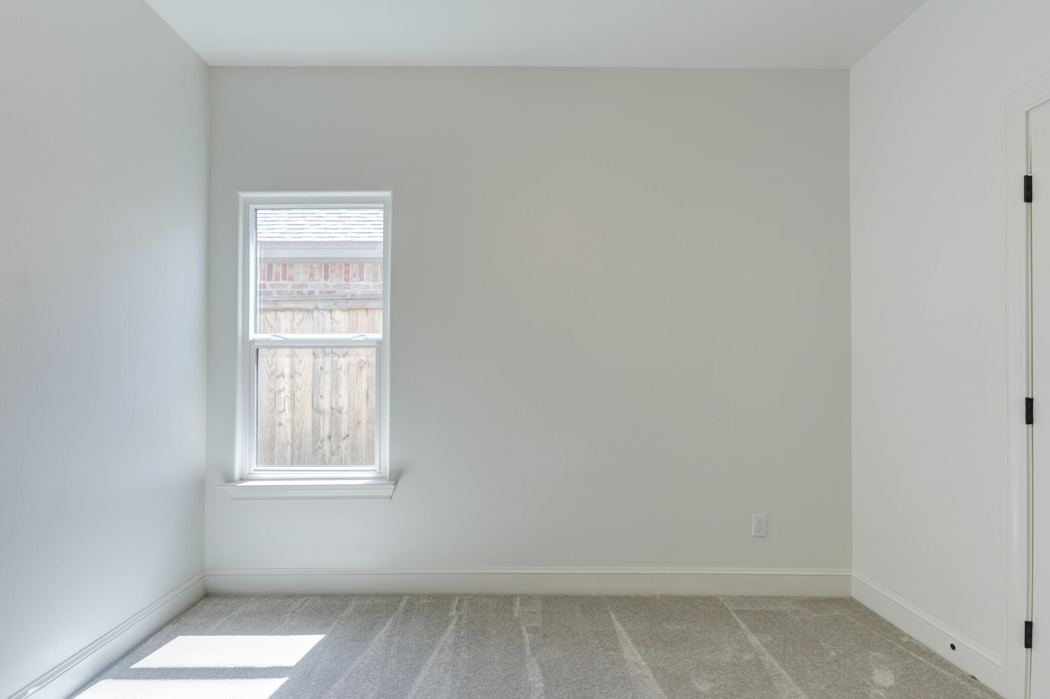 5720 119th Street Lubbock, TX 79424 - Photo 16 of 43 an empty room with a window