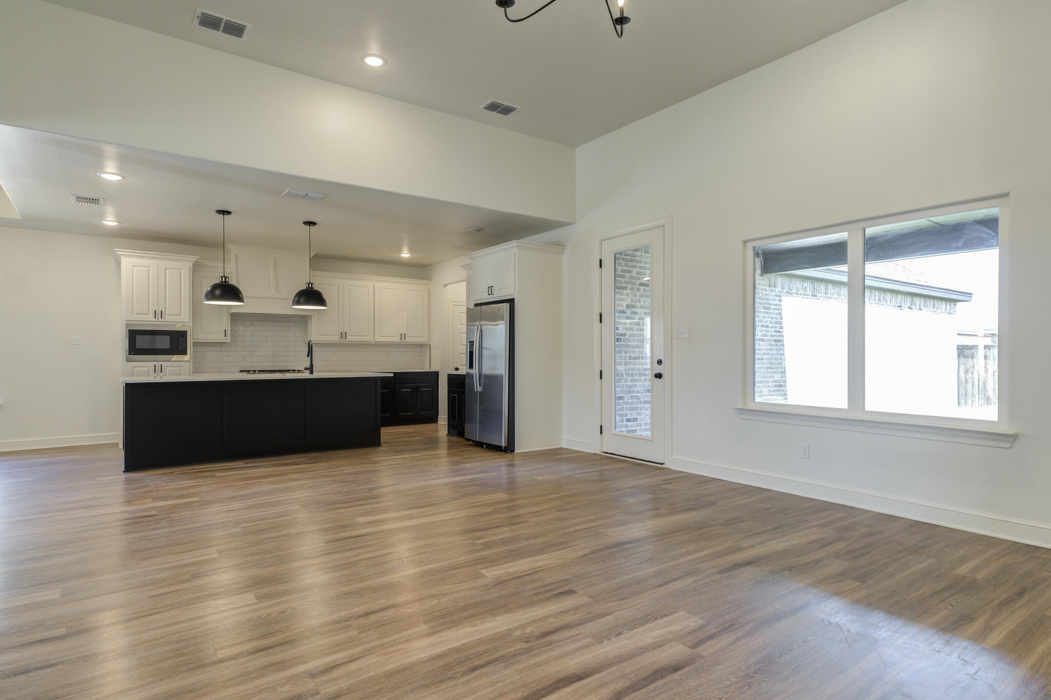 5720 119th Street Lubbock, TX 79424 - Photo 19 of 43 a view of kitchen with wooden floor