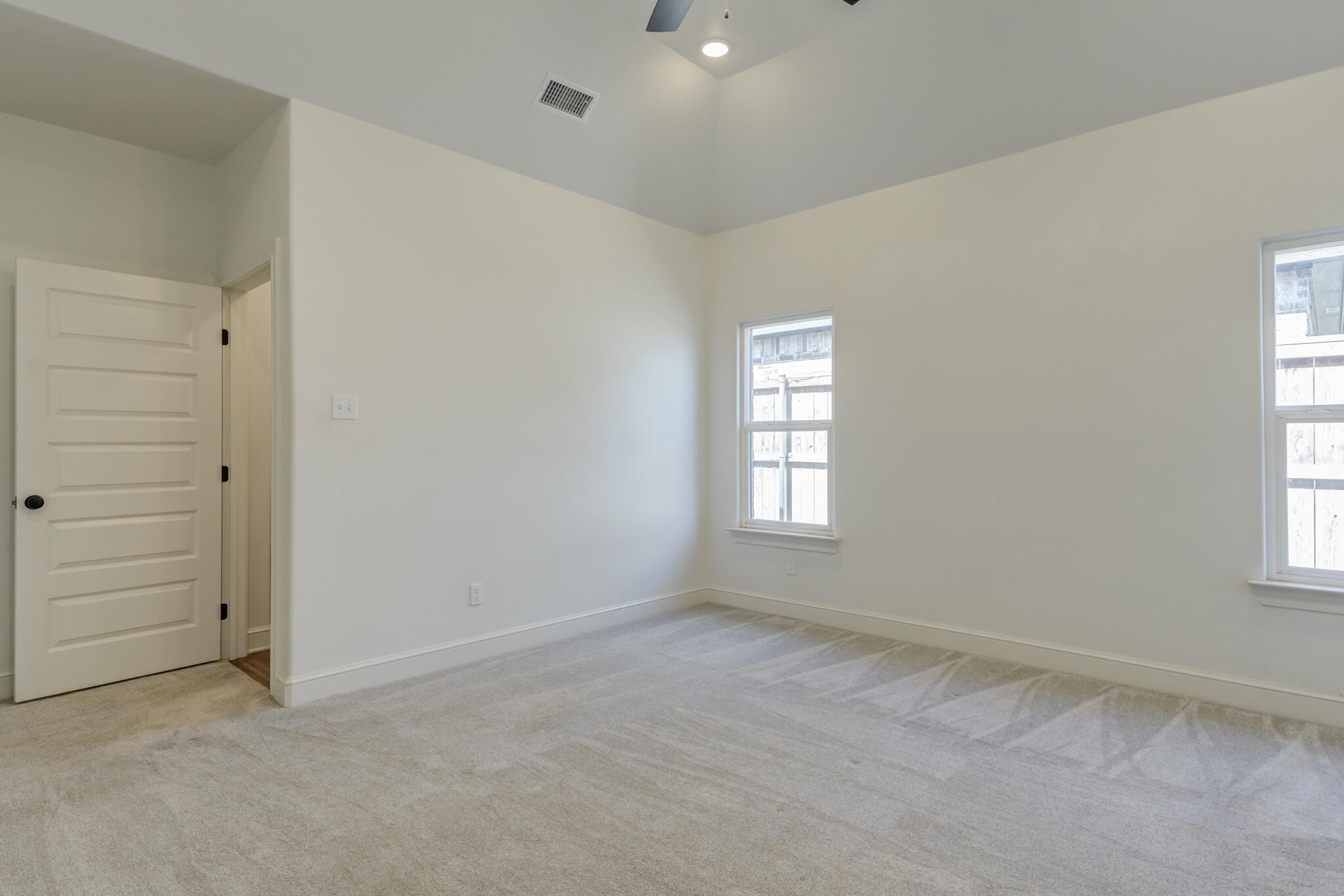 5720 119th Street Lubbock, TX 79424 - Photo 35 of 43 an empty room with windows and closet