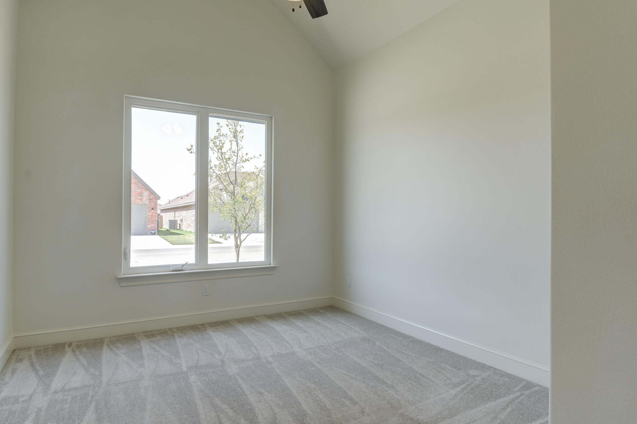 5720 119th Street Lubbock, TX 79424 - Photo 5 of 43 an empty room with a window