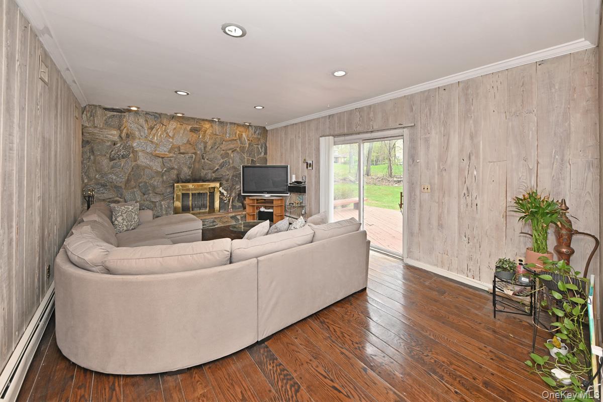 19 Sterling Road Spring Valley, NY 10977 - Photo 7 of 20 a living room with furniture and a potted plant