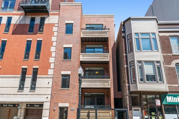 a front view of a multi story building