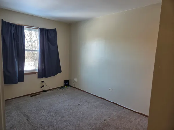 an empty room with window