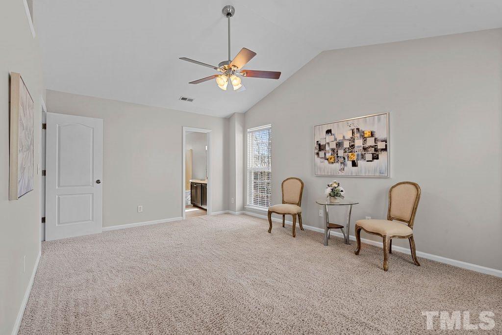 6823 Edwell Court Raleigh, NC 27617 - Photo 14 of 30 a view of a livingroom with chairs