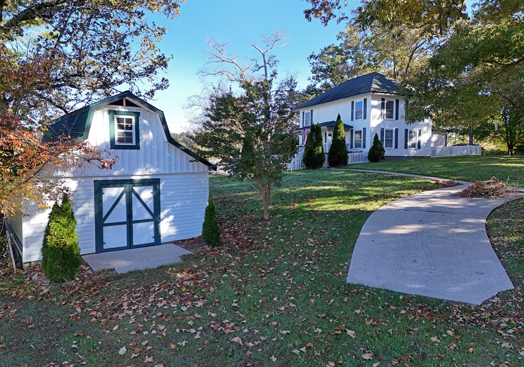 63 Loving Road Morganton, GA 30560 - Photo 16 of 58 a view of a house with a yard