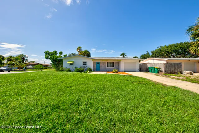 a front view of a house having yard
