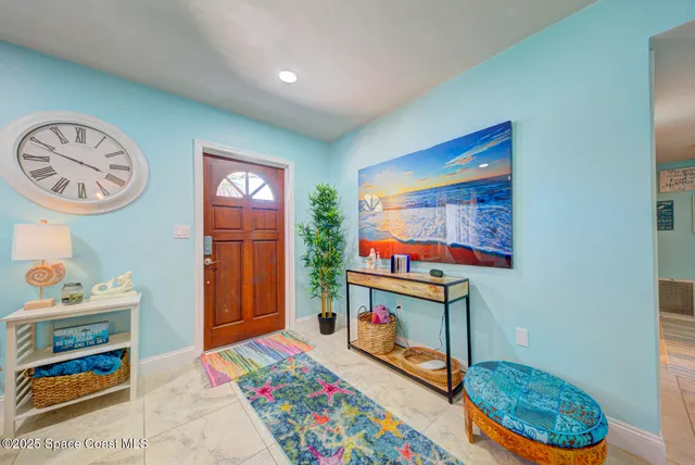 a room with toys and paintings on the wall