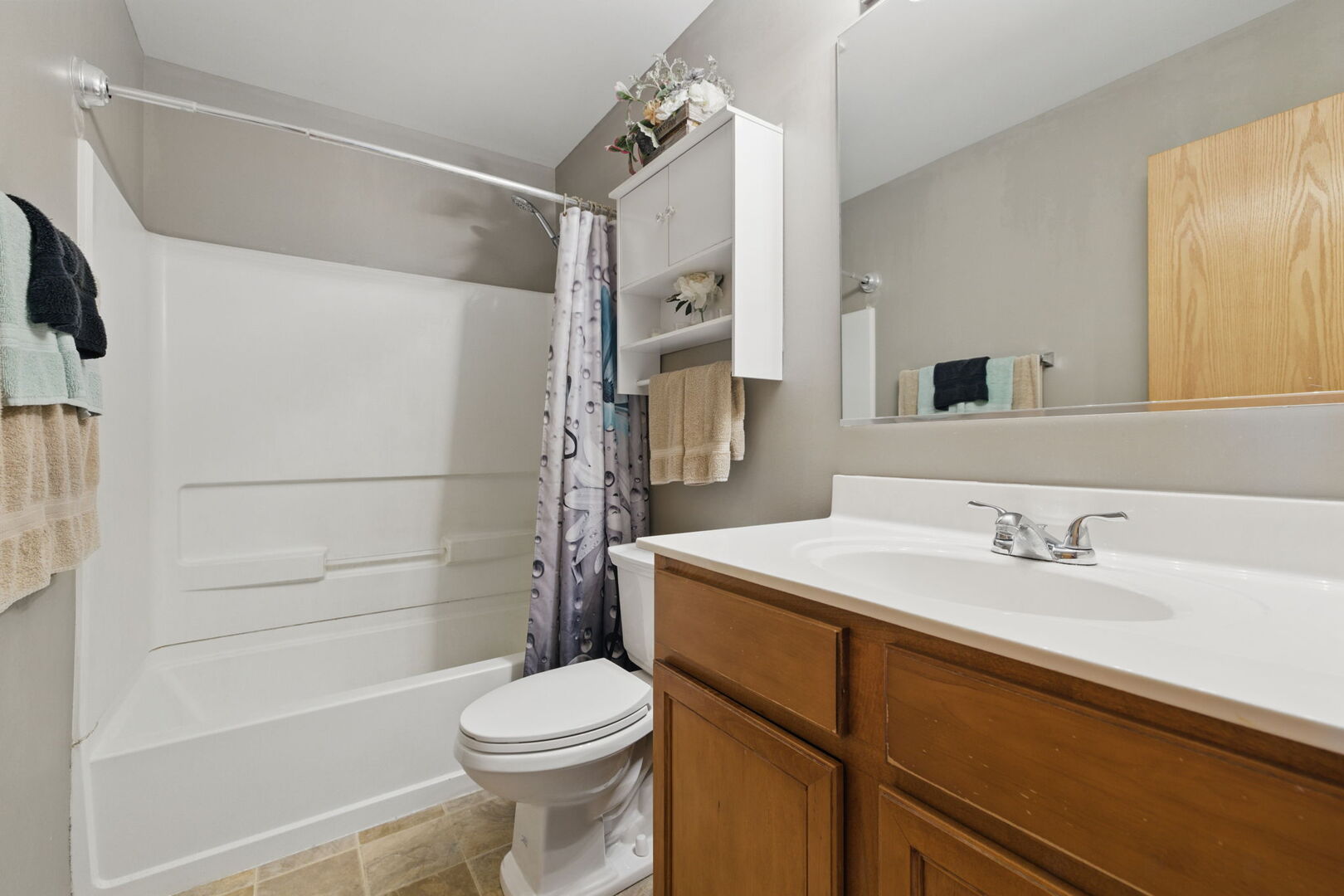 15340 Kenmare Circle Manhattan, IL 60442 - Photo 14 of 19 a bathroom with a sink a toilet and shower