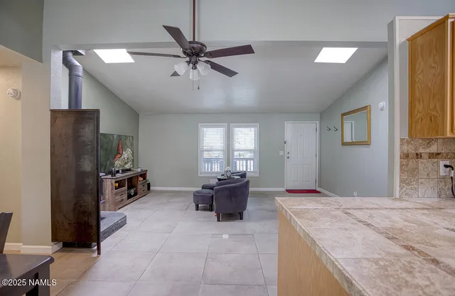 a workspace with furniture and wooden floor