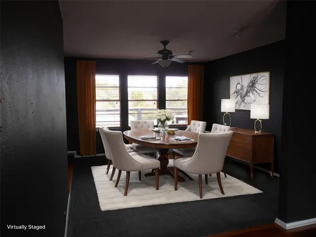 a large kitchen with stainless steel appliances granite countertop a stove and a refrigerator