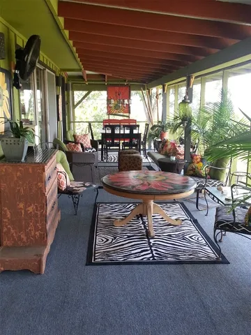 a view of balcony with patio
