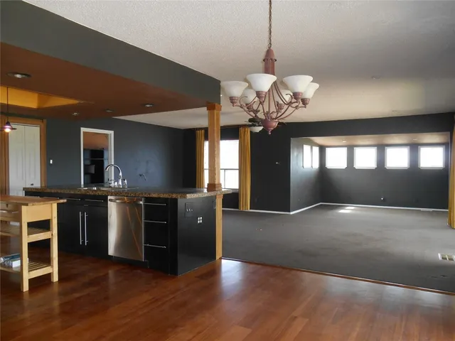 a view of a livingroom with furniture and window