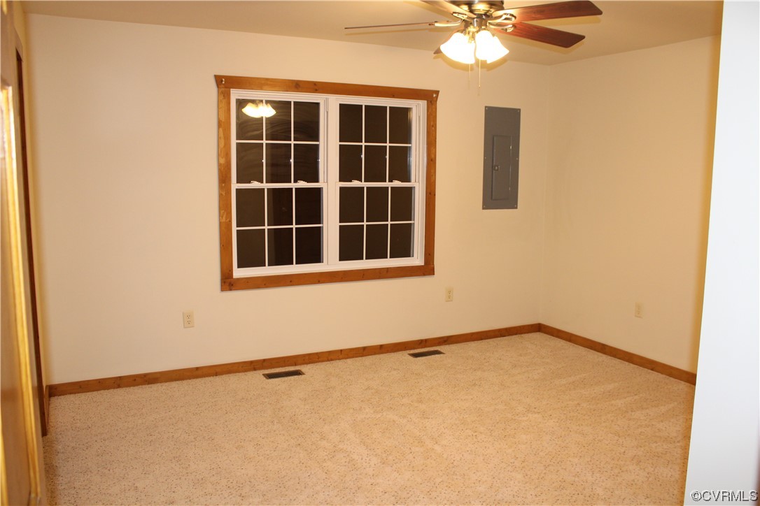 19577 Templeton Road Carson, VA 23830 - Photo 12 of 16 a view of an empty room with a window