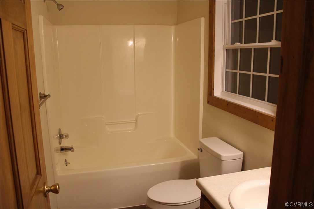 19577 Templeton Road Carson, VA 23830 - Photo 13 of 16 a white toilet sitting next to a bath tub