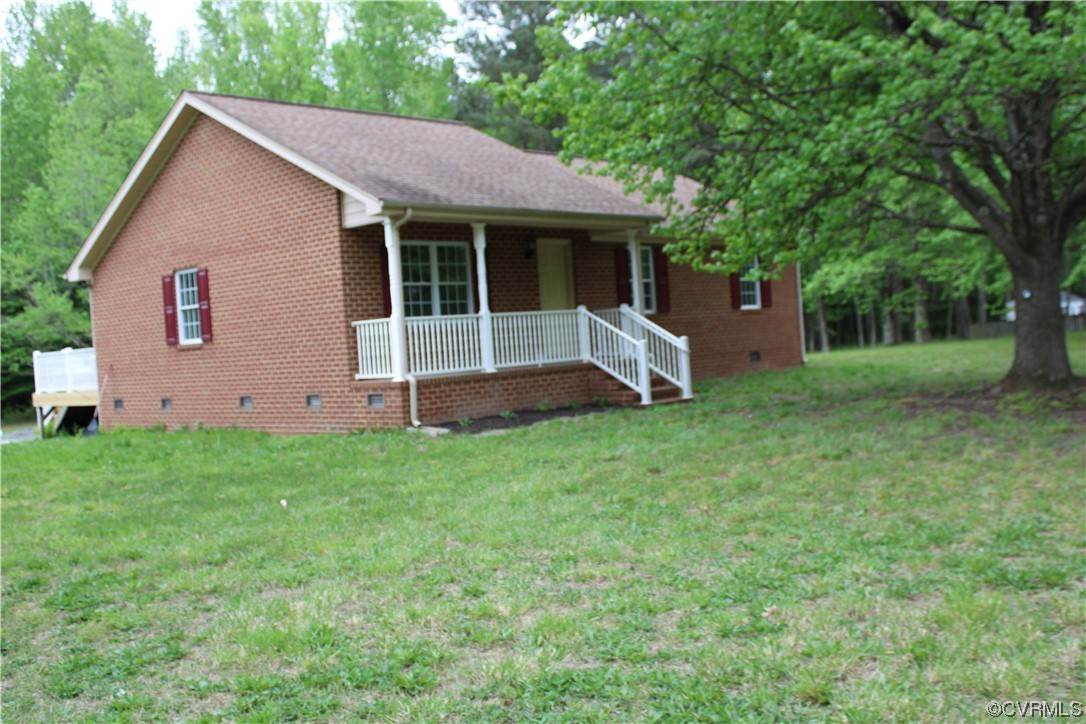 19577 Templeton Road Carson, VA 23830 - Photo 15 of 16 a view of a house with backyard