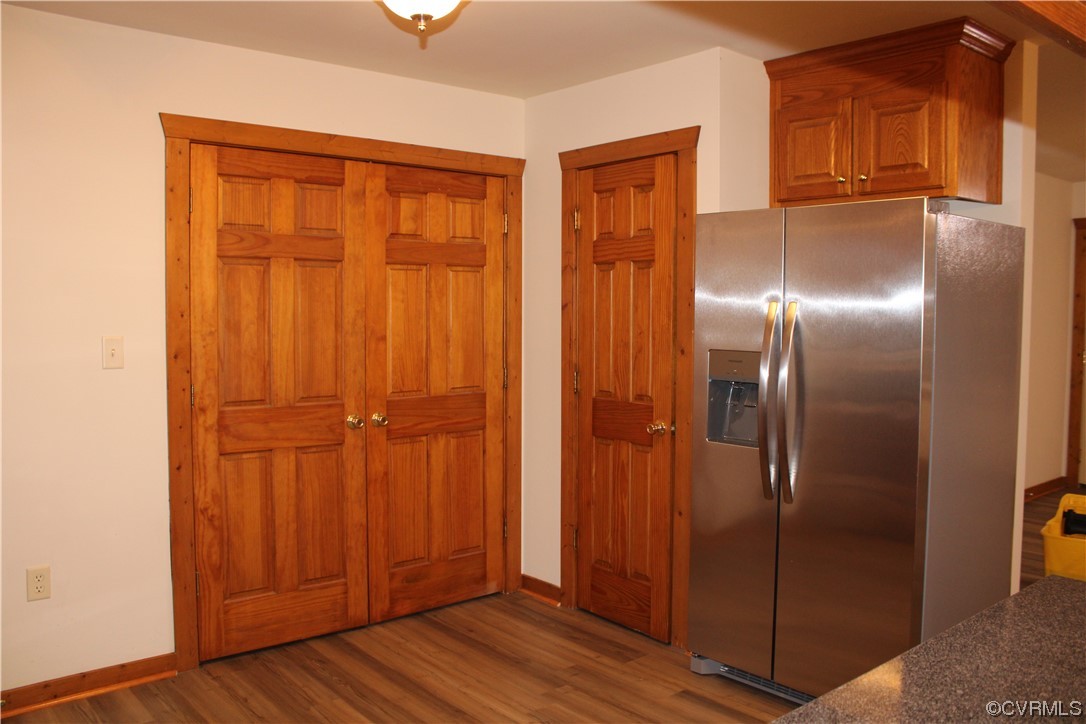 19577 Templeton Road Carson, VA 23830 - Photo 6 of 16 a view of a hallway with wooden floor