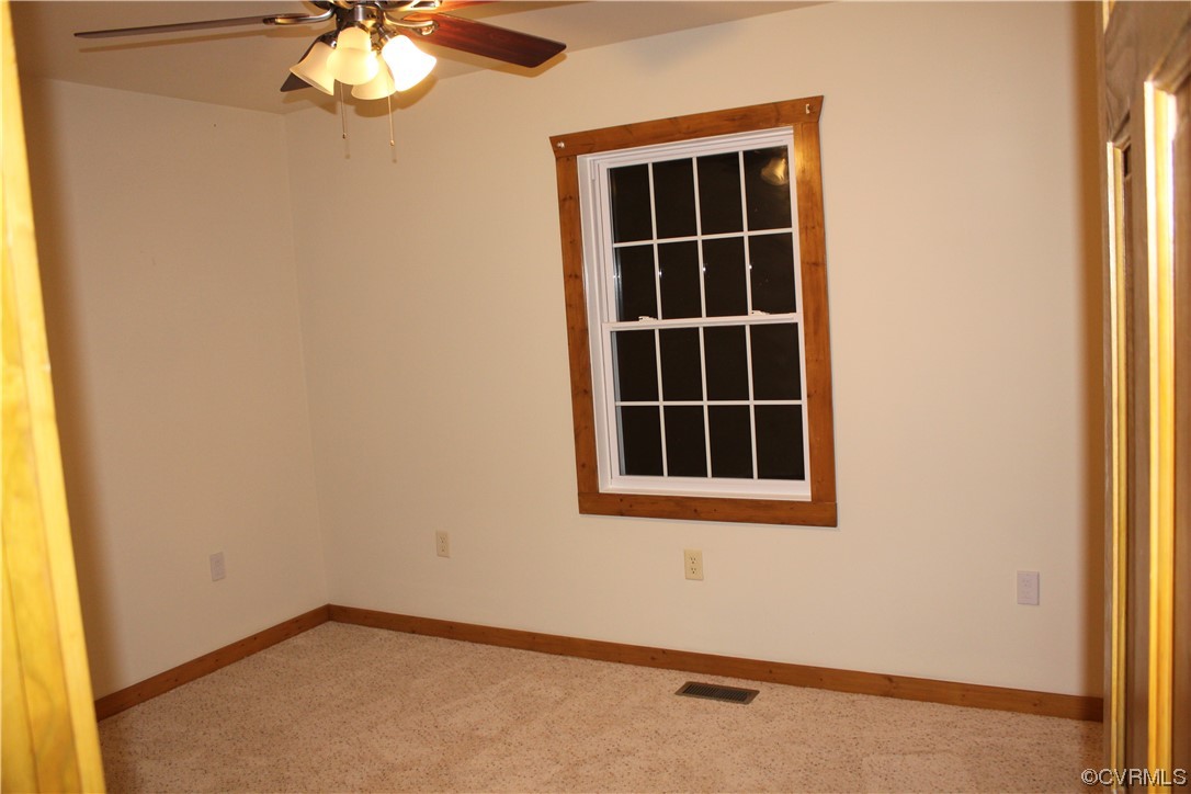 19577 Templeton Road Carson, VA 23830 - Photo 8 of 16 an empty room with a window
