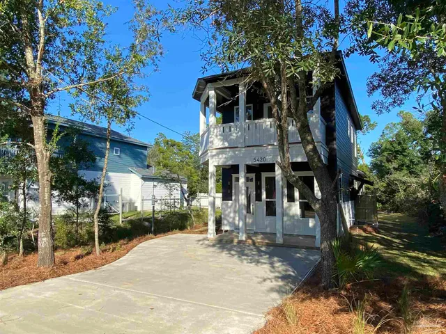 a front view of a building with street view