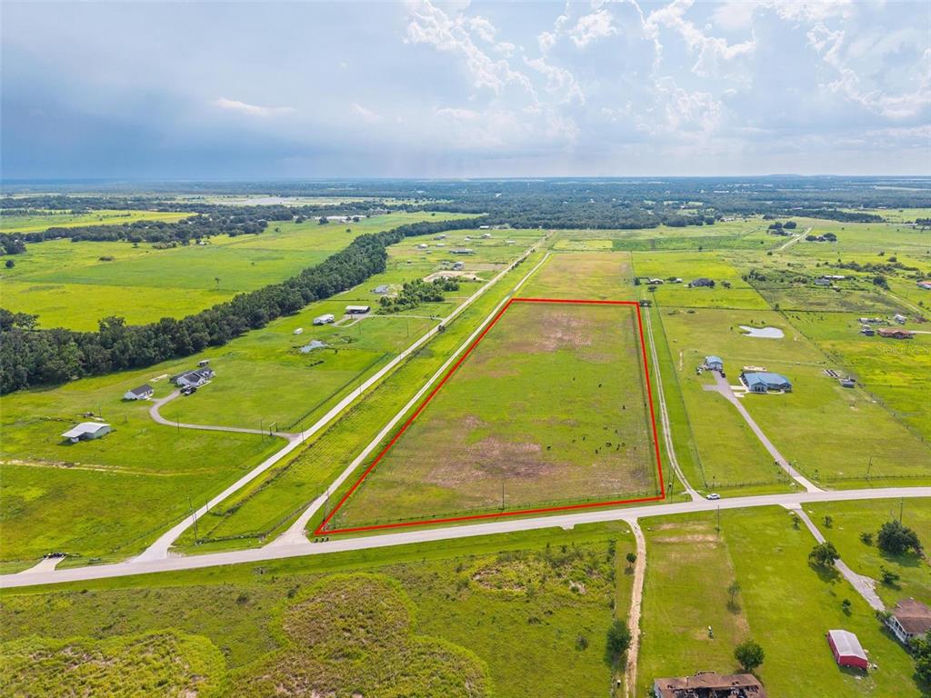 903 Brook Road North Fort Meade, FL 33841 - Photo 17 of 17 a view of an outdoor space and tennis court